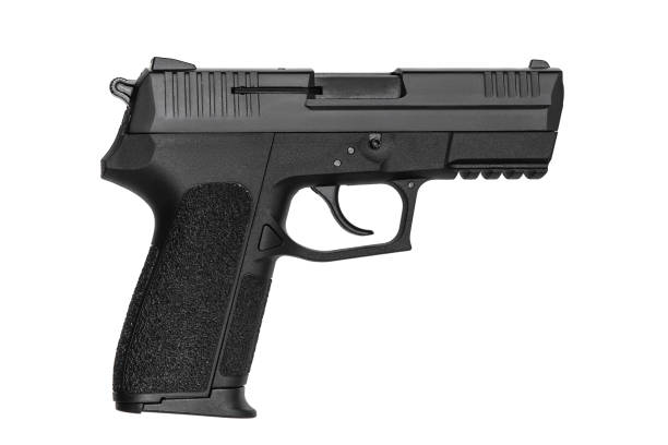 istock Black gun pistol isolated on white background 1139334020
