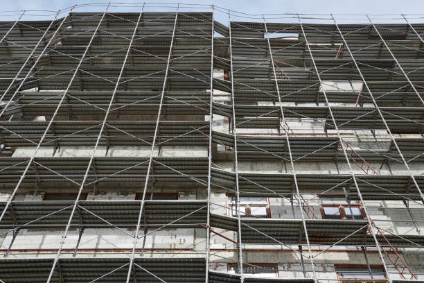 istock new building under construction, scaffolding and concrete 1139334134