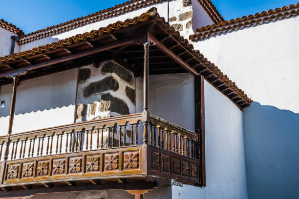 Small Spanish balcony on the second floor of a rural house in the village of Vilaflor on the island of Tenerife.