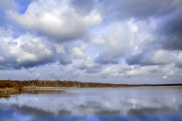 istock Reflection of clouds in water. 1139336394