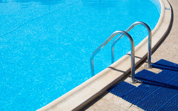 istock Outdoor swimming pool with blue clean Water 1139337951
