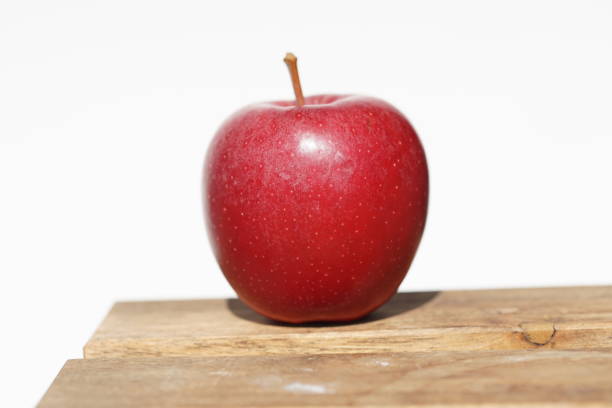 istock Single red Apple on sunny day in macro 1139339907