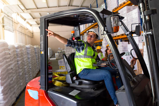 istock Business colleagues working with computer in warehouse 1139345303