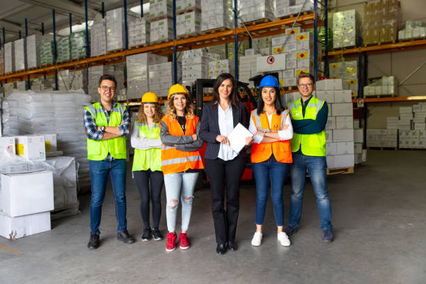 istock Business colleagues working with computer in warehouse 1139346678