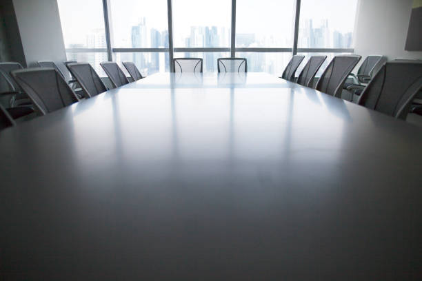 istock View of conference room table and chairs 1139348435
