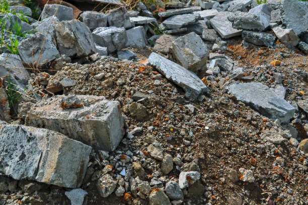 Ruins of a building in the city. View on a collapsed concrete industrial building.