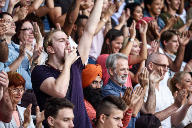 istock Whistling on fingers at the match 1139349642