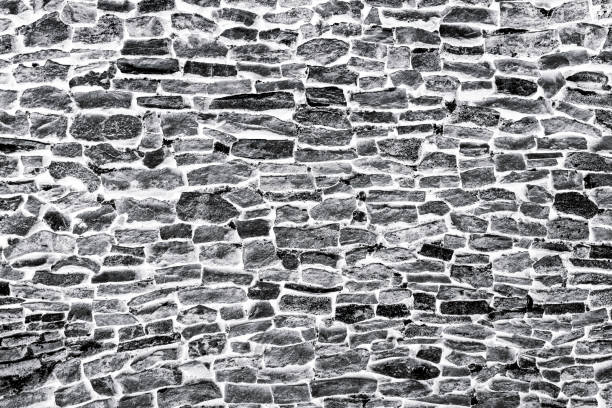 istock Old stone wall, black and white abstract background, copy space 1139354024