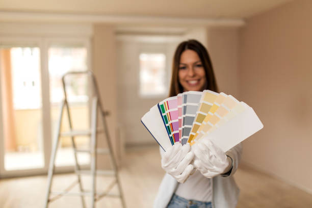 istock Smiling woman showing color palette 1139354572