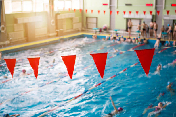istock Red flags hanging in the pool at the competition 1139356322