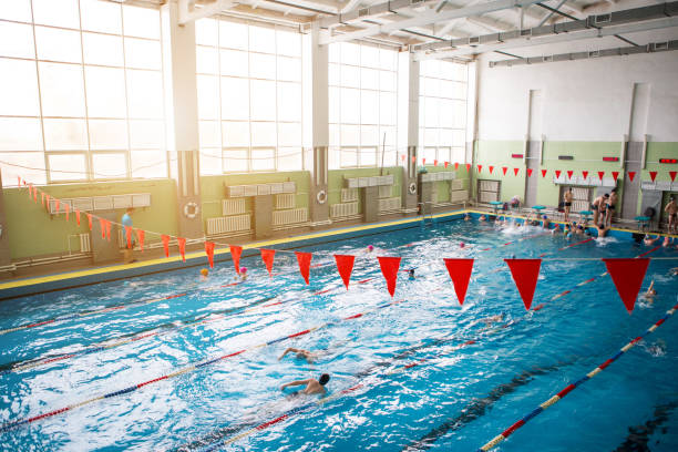 istock Red flags hanging in the pool at the competition 1139356335