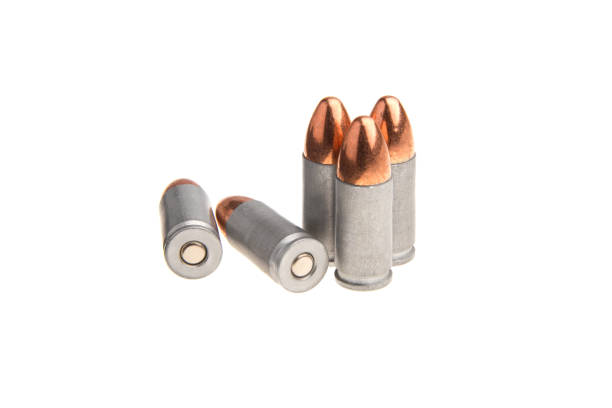 istock cartridges for a pistol isolated on white background 1139358769