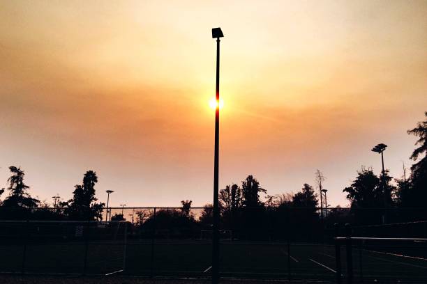 istock An electric pole bisects the sun near sunset 1139361578