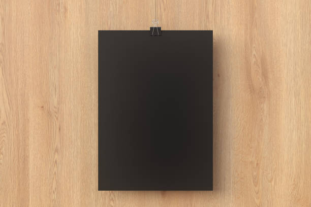 istock Blank black paper poster hanging on binder clip 1139361715