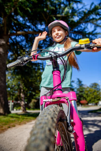 istock Happy Little girl with her bicycle 1139363618