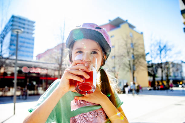 Thirsty Little Girl a enjoying Strawberry Juice Thirsty Little Girl a enjoying Strawberry Juice 9 stock pictures, royalty-free photos & images