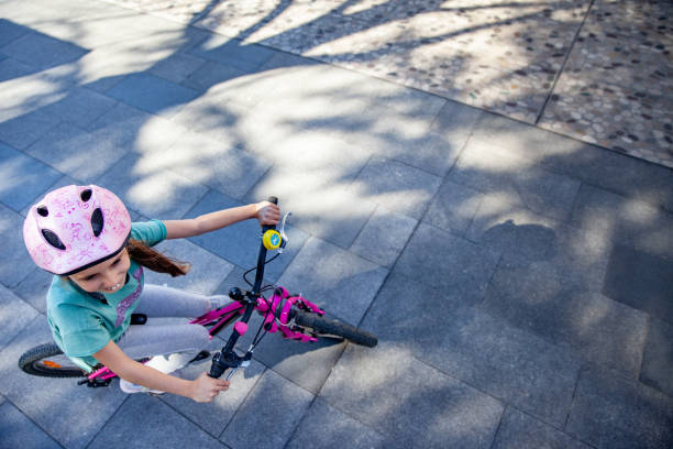 istock High angle view of a Girl on bicycle 1139363637
