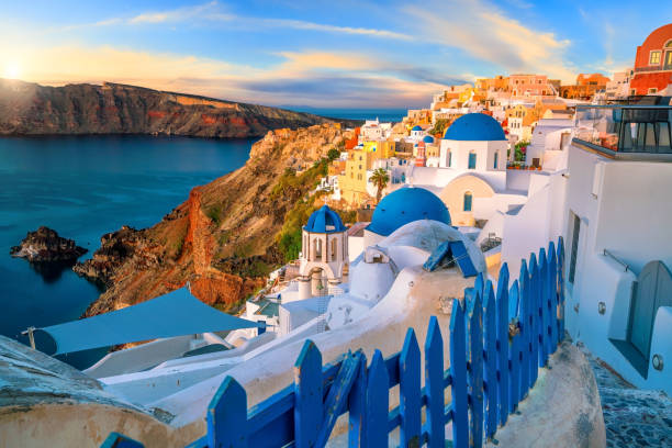 Sunset on the famous Oia city, Greece, Europe Great twilight view of Santorini island. Sunset on the famous Oia city, Greece, Europe fira santorini stock pictures, royalty-free photos & images