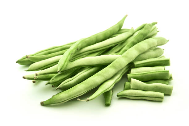 istock Green beans handful isolated on white background cutout 1139373994