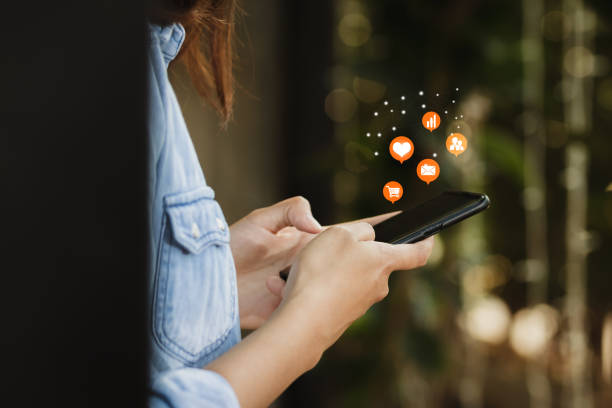 istock woman using smartphone in free time. 1139384376