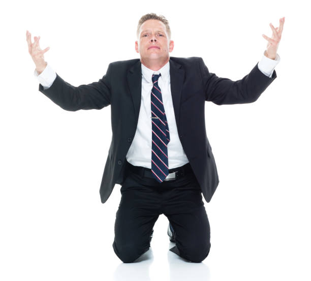 istock Businessman is pleading and begging 1139387777