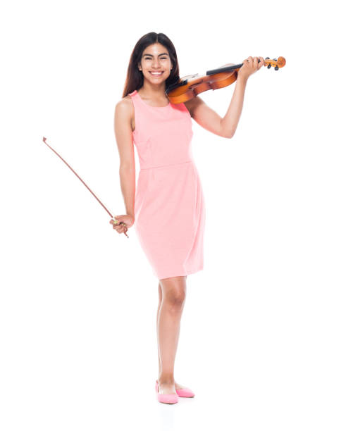 istock Beautiful young latina playing the violin 1139390484