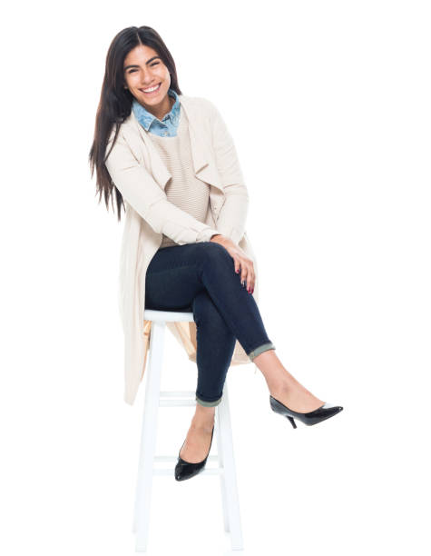 istock Attractive young latino female is sitting 1139391606