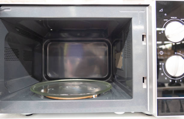 istock open empty new microwave , Inside of the microwave oven 1139394350