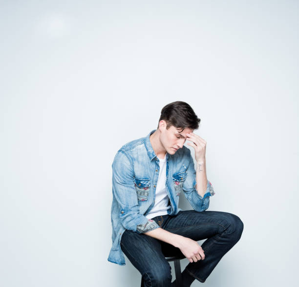 istock Handsome young man feeling depressed and sad 1139396104