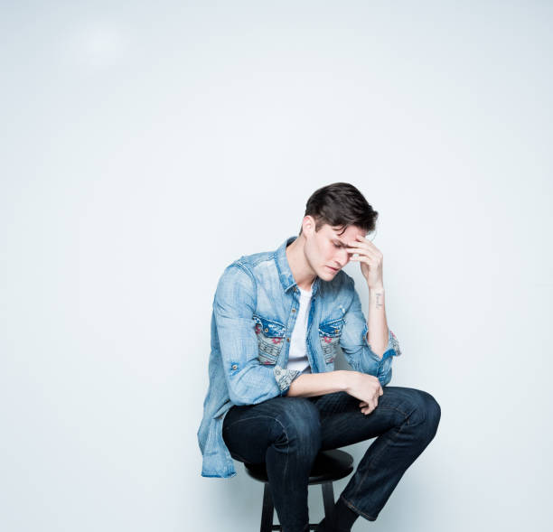 istock Handsome young man feeling depressed and sad 1139396125