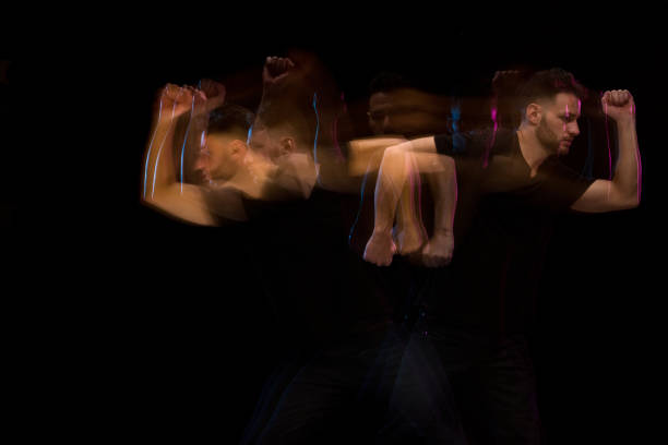 istock Good looking man in a black shirt dancing 1139396468