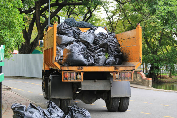 istock Garbage Truck with loading waste in park garden. 1139402595