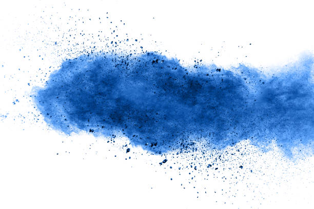 istock Abstract blue dust explosion on white background. Freeze motion of blue powder splash. Painted Holi in festival. 1139402747