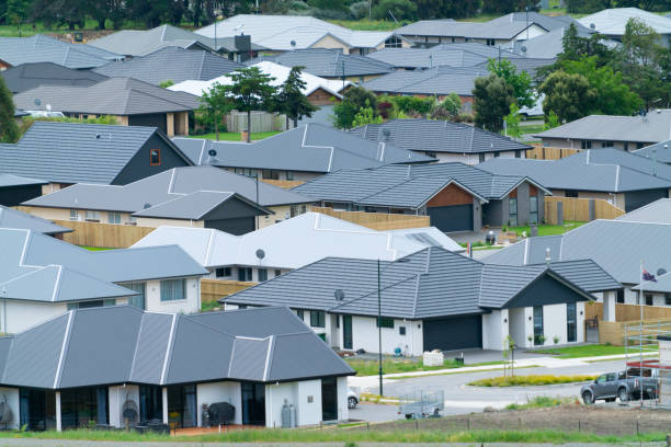 New residential neighborhood New residential neighborhood grey roofs of homes just constructed clos together. marlborough new zealand stock pictures, royalty-free photos & images