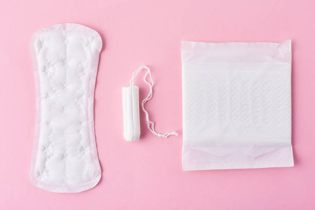 istock Sanitary pad and menstrual tampon on a pink background 1139412834