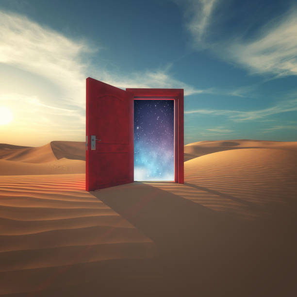 istock Opened door in the desert to the space. 1139415469