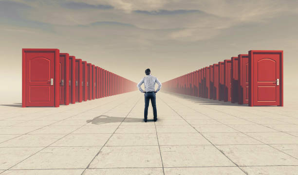 businessman in front of two  lines doors . the concept of hard choices. - tough choices imagens e fotografias de stock