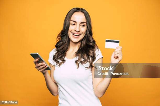 Like Falling Off A Log A Picture Which Shows An Easy Way Of Using Modern Gadgets Through The Experience Of Cute Girl Who Has Only Pleasant Emotions From Doing It Stock Photo - Download Image Now