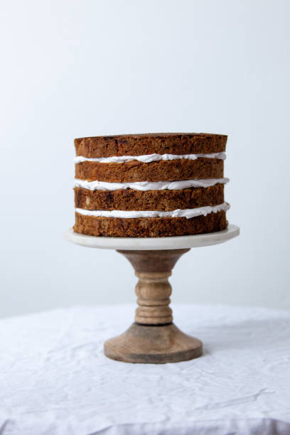 istock Delicious sliced carrot cake on white background with copy space 1139416670