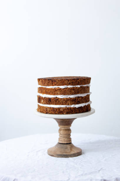 istock Delicious sliced carrot cake on white background with copy space 1139416678