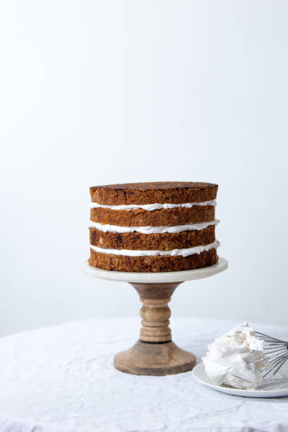 istock Delicious sliced carrot cake on white background with copy space 1139416684