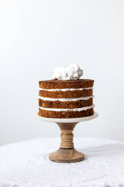 istock Delicious sliced carrot cake on white background with copy space 1139416704
