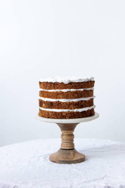 istock Delicious sliced carrot cake on white background with copy space 1139416716