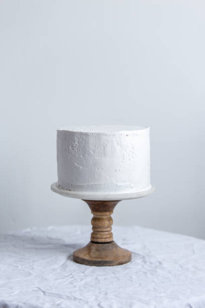 istock vegetarian wedding or birthday white cake on a white background 1139416728