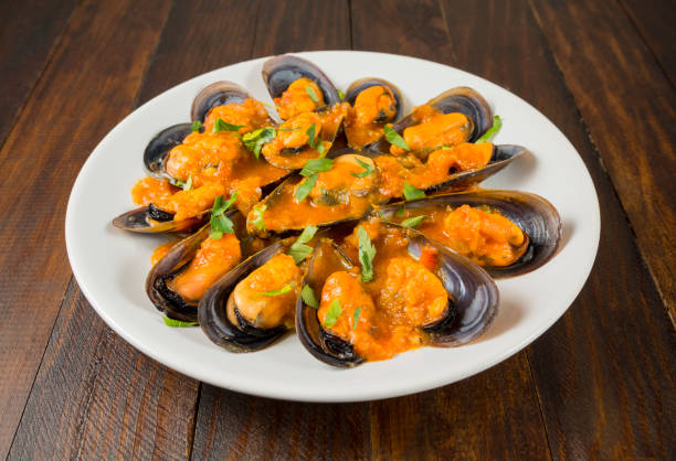 istock Mussels in marinara sauce 1139420332