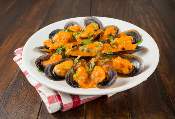 istock Mussels in marinara sauce 1139420339