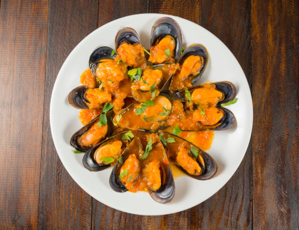 istock Mussels in marinara sauce 1139420340