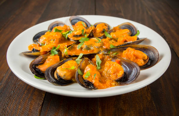 istock Mussels in marinara sauce 1139420343