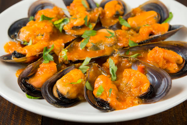 istock Mussels in marinara sauce 1139420346