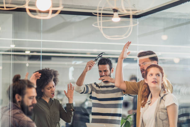 istock Group of frustrated freelance workers having problems in the office. 1139426119